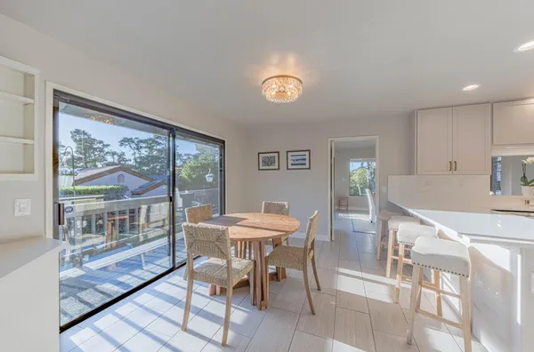 a kitchen with granite countertop cabinets stainless steel appliances and a sink
