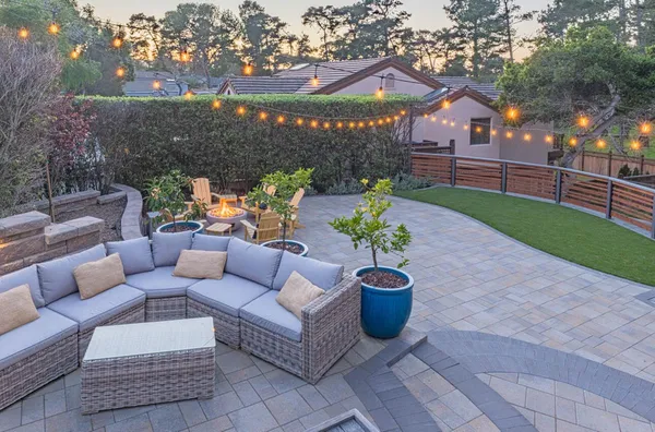 a kitchen with white cabinets white stainless steel appliances and sink