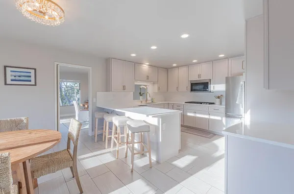 a bathroom with a sink a vanity and a mirror