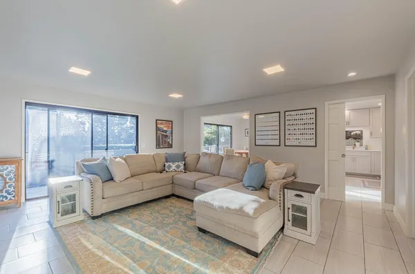 a view of entryway with livingroom and hallway