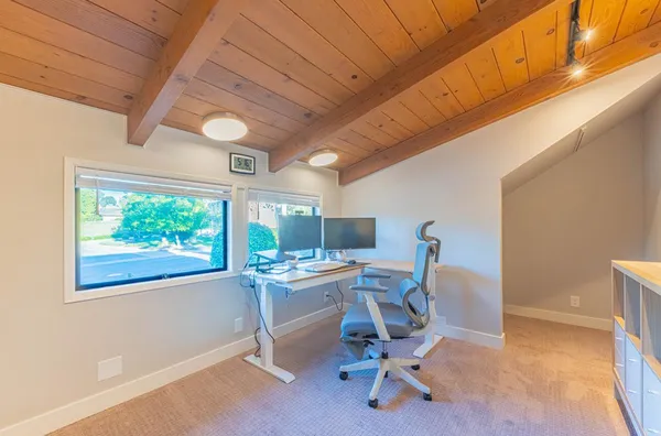 a bathroom with a bathtub and a toilet