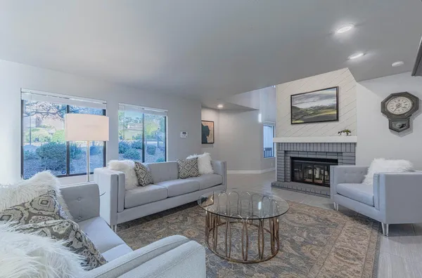 a view of a dining room with furniture window and outside view