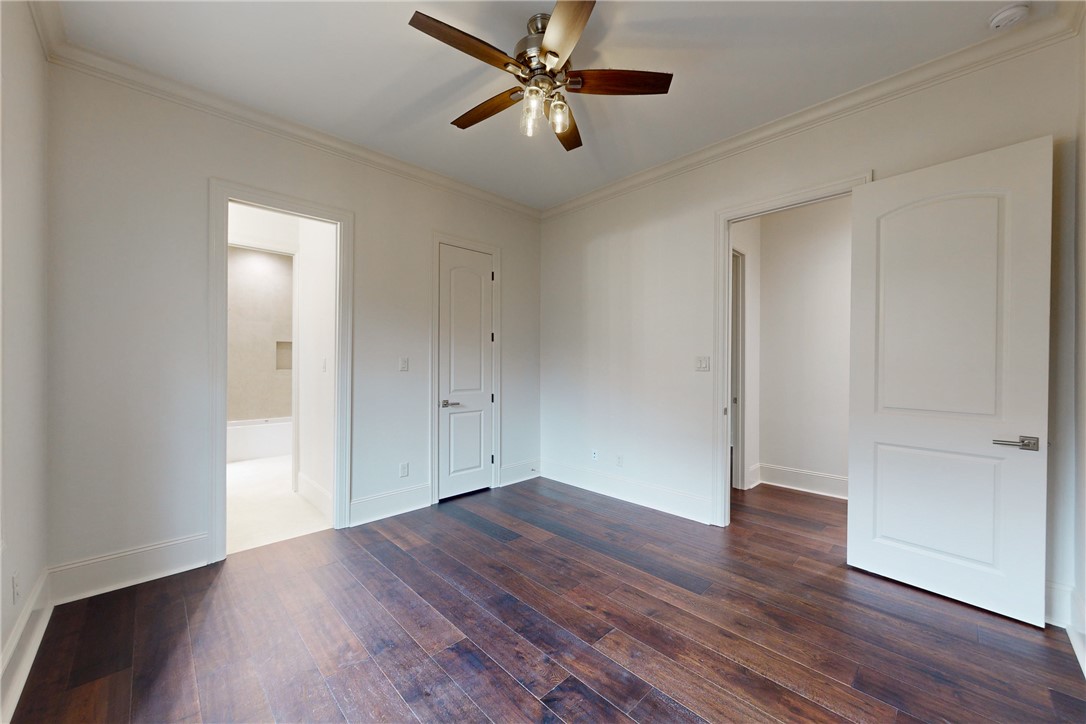 3317 Legacy Court Bryan, TX 77802 - Photo 17 of 28 an empty room with wooden floor and windows