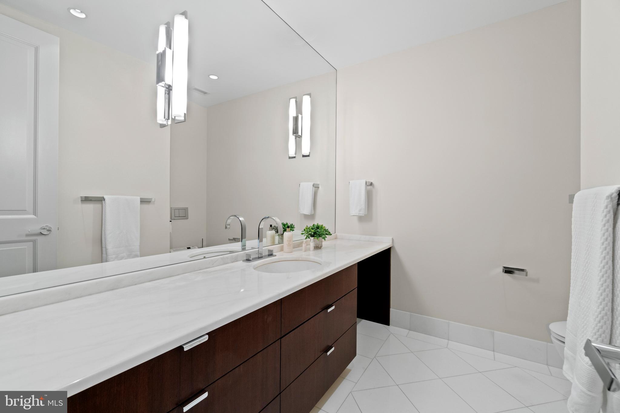 3150 South Street Northwest, Unit 1A Washington, DC 20007 - Photo 29 of 48 Two separate WCs with vanties