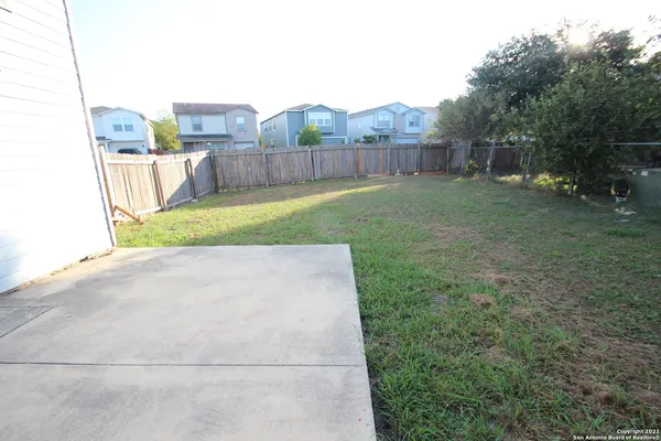 a view of a backyard with a garden