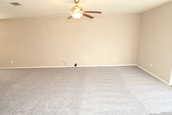 a view of a room with an empty space