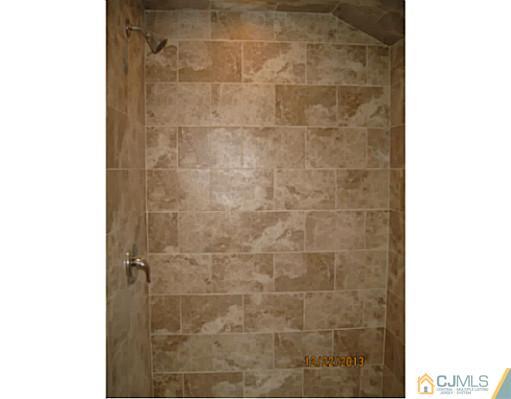 24 Hill Road Edison, NJ 08817 - Photo 11 of 16 a bathroom with a shower