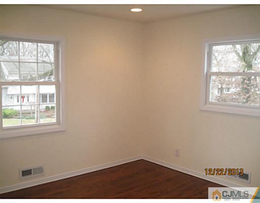 24 Hill Road Edison, NJ 08817 - Photo 12 of 16 an empty room with a window