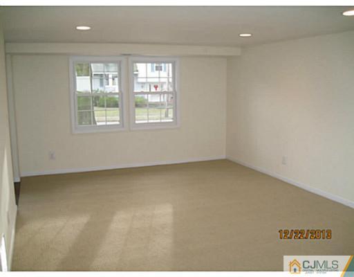 24 Hill Road Edison, NJ 08817 - Photo 7 of 16 an empty room with windows