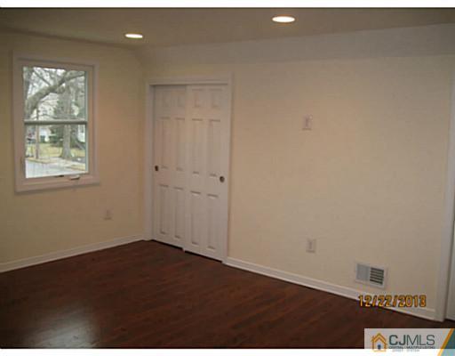 24 Hill Road Edison, NJ 08817 - Photo 10 of 16 an empty room with windows