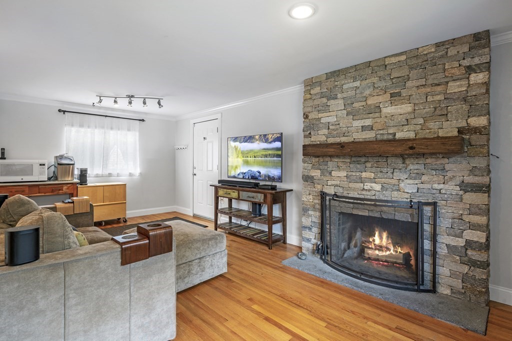 6 Ames Road Marblehead, MA 01945 - Photo 15 of 32 a living room with furniture and a fireplace