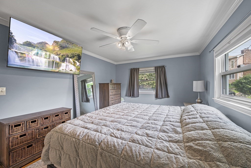 6 Ames Road Marblehead, MA 01945 - Photo 18 of 32 a bedroom with a bed and a window