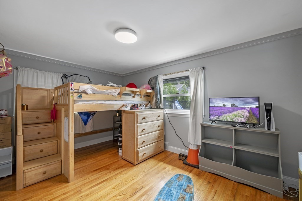 6 Ames Road Marblehead, MA 01945 - Photo 20 of 32 a bed room with a bed and furniture