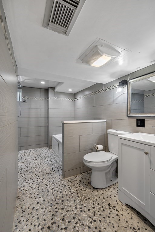 6 Ames Road Marblehead, MA 01945 - Photo 23 of 32 a bathroom with a sink a toilet and a shower