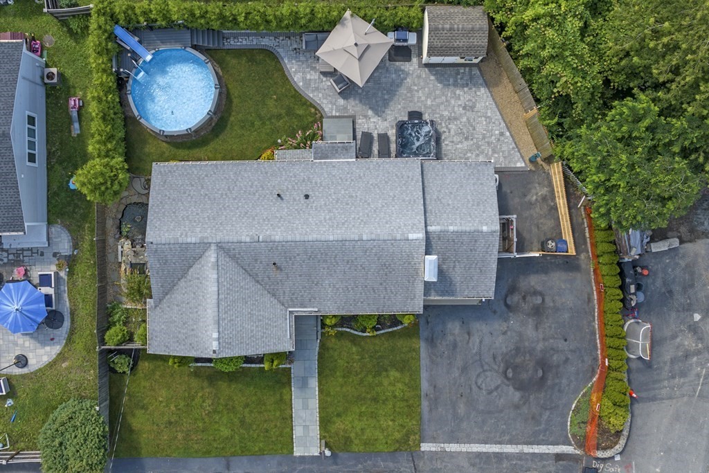 6 Ames Road Marblehead, MA 01945 - Photo 3 of 32 an aerial view of a house with garden space and a swimming pool