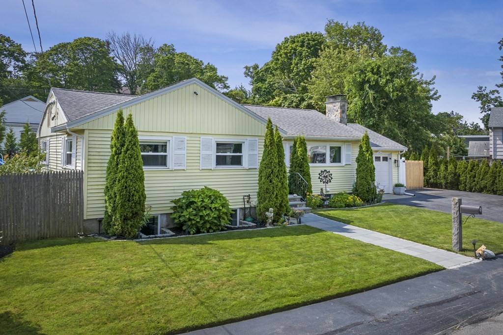 6 Ames Road Marblehead, MA 01945 - Photo 32 of 32 a view of a house with a yard and plants