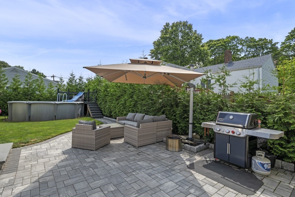 6 Ames Road Marblehead, MA 01945 - Photo 4 of 32 an outdoor space with patio and wooden fence
