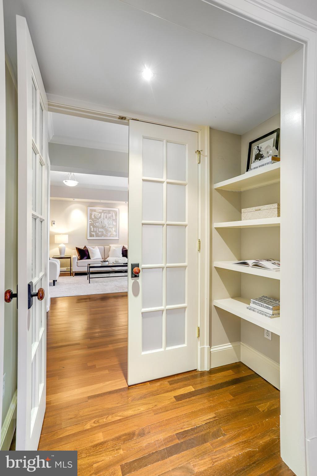 2127 California Street Northwest, Unit 201 Washington, DC 20008 - Photo 11 of 25 Built-ins and French door to Living Room