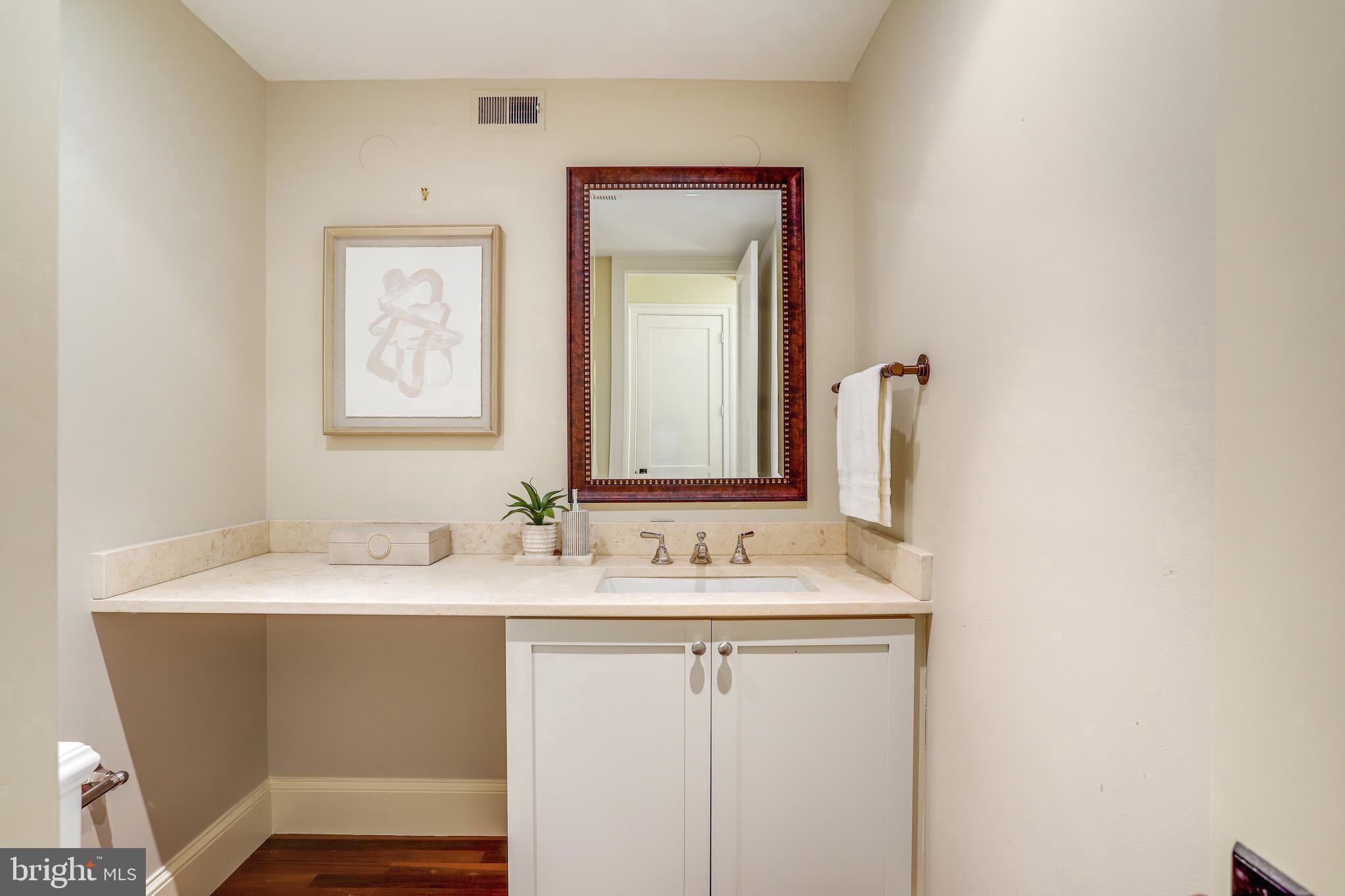 2127 California Street Northwest, Unit 201 Washington, DC 20008 - Photo 17 of 25 Half Bath off the foyer