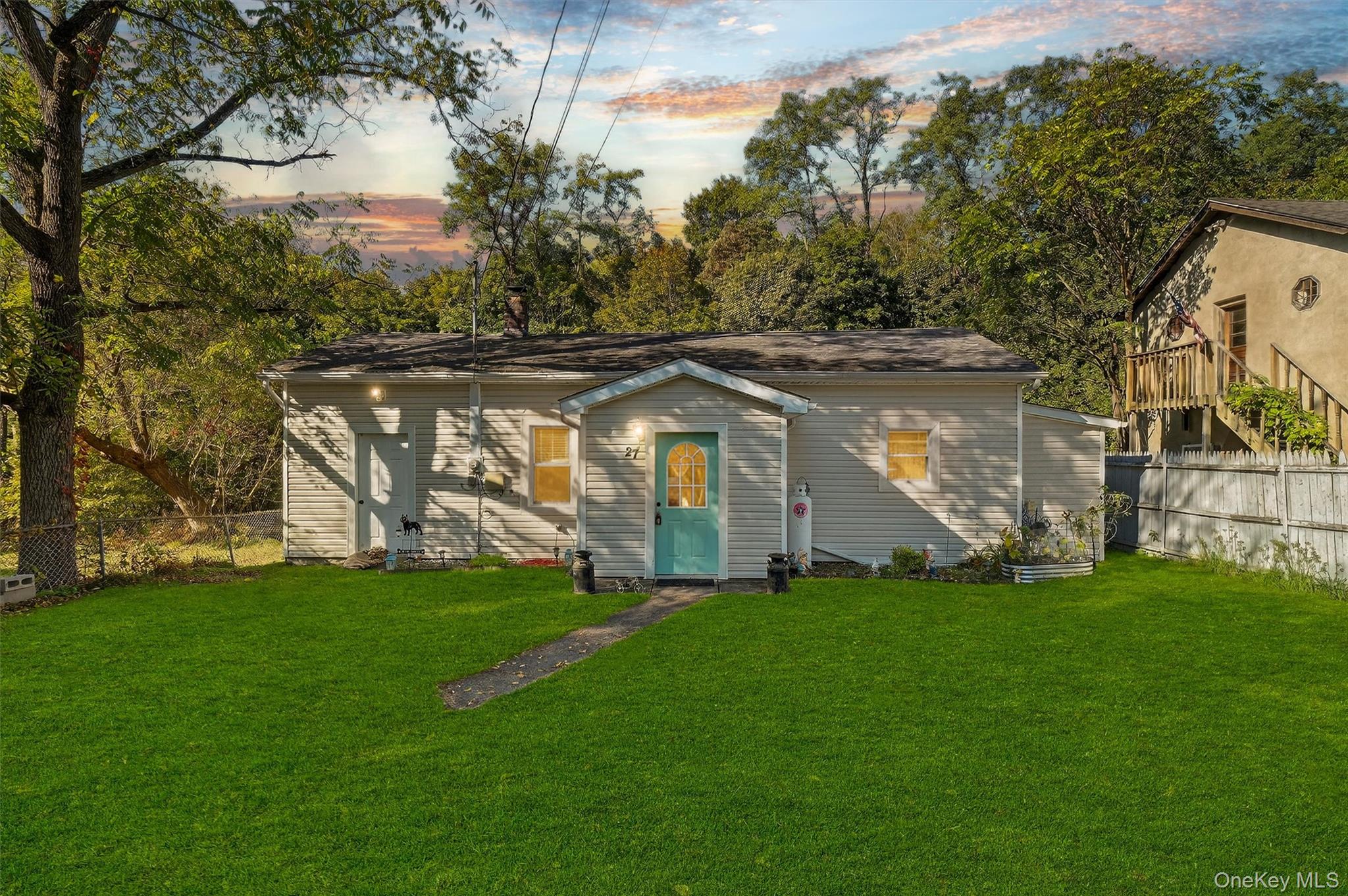 27 Peckham Road Poughkeepsie, NY 12603 - Photo 1 of 27 a front view of a house with a yard