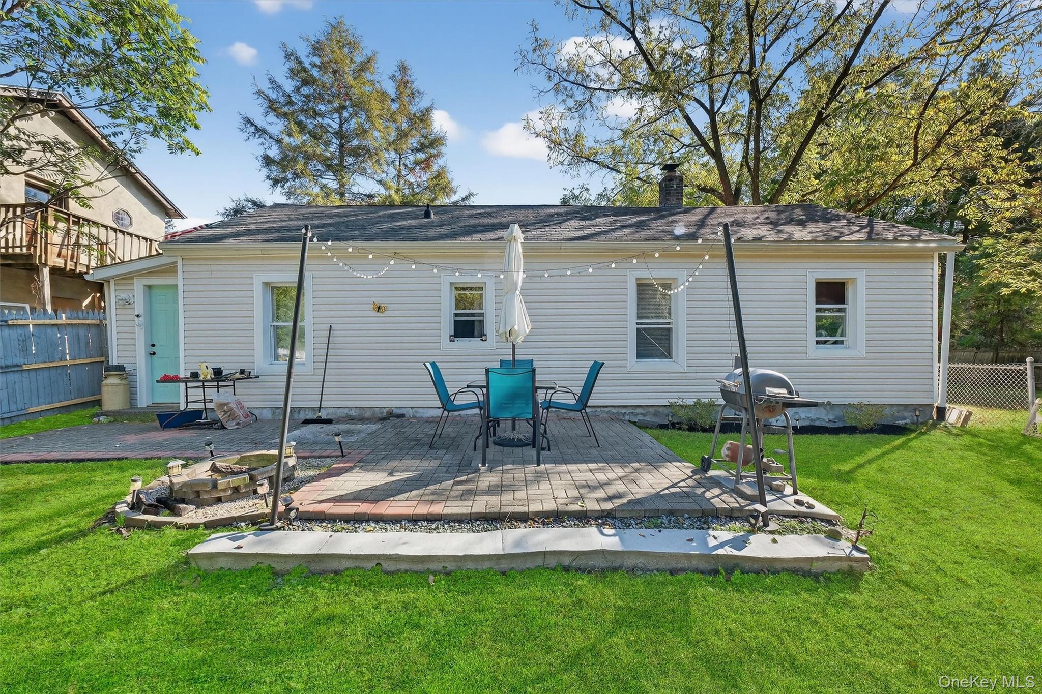 27 Peckham Road Poughkeepsie, NY 12603 - Photo 25 of 27 a front view of house with yard and outdoor seating