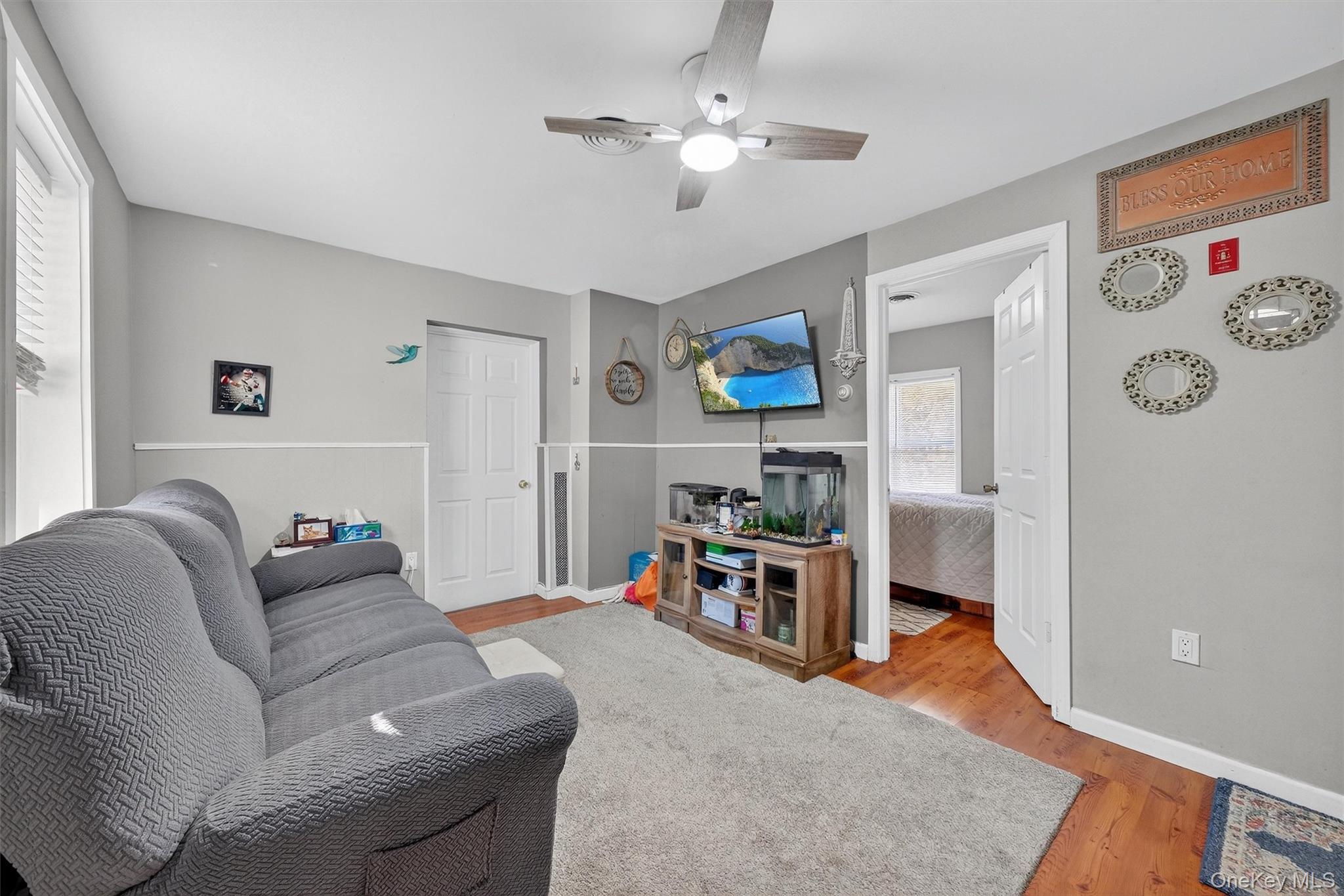 27 Peckham Road Poughkeepsie, NY 12603 - Photo 6 of 27 a living room with furniture and a flat screen tv