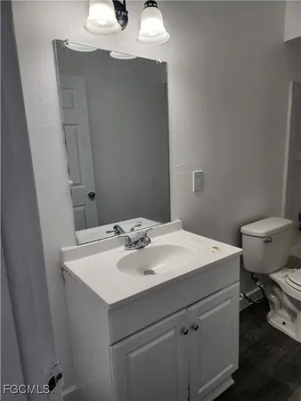 a bathroom with a sink and a toilet
