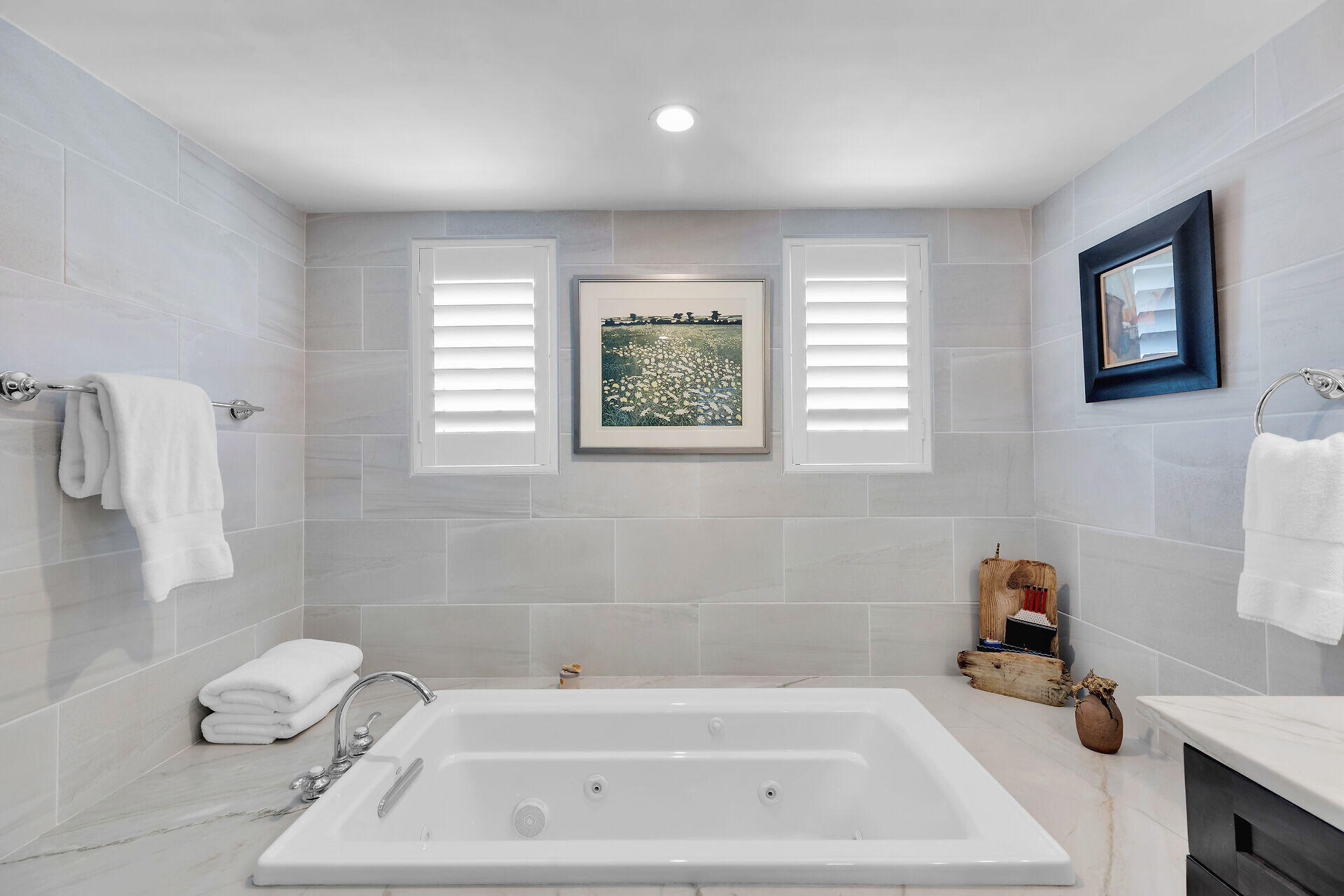 141 Simonton Street Key West, FL 33040 - Photo 30 of 49 a bathroom with a bathtub sink and vanity