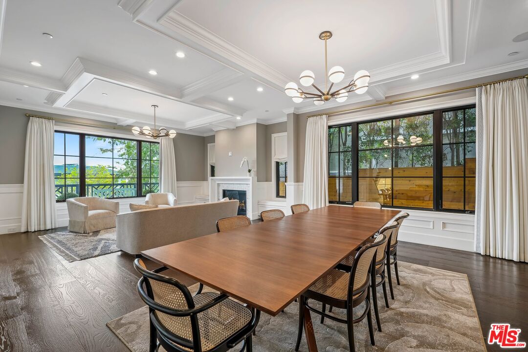 9348 Cresta Drive Los Angeles, CA 90035 - Photo 11 of 44 a view of a dining room with furniture window and wooden floor