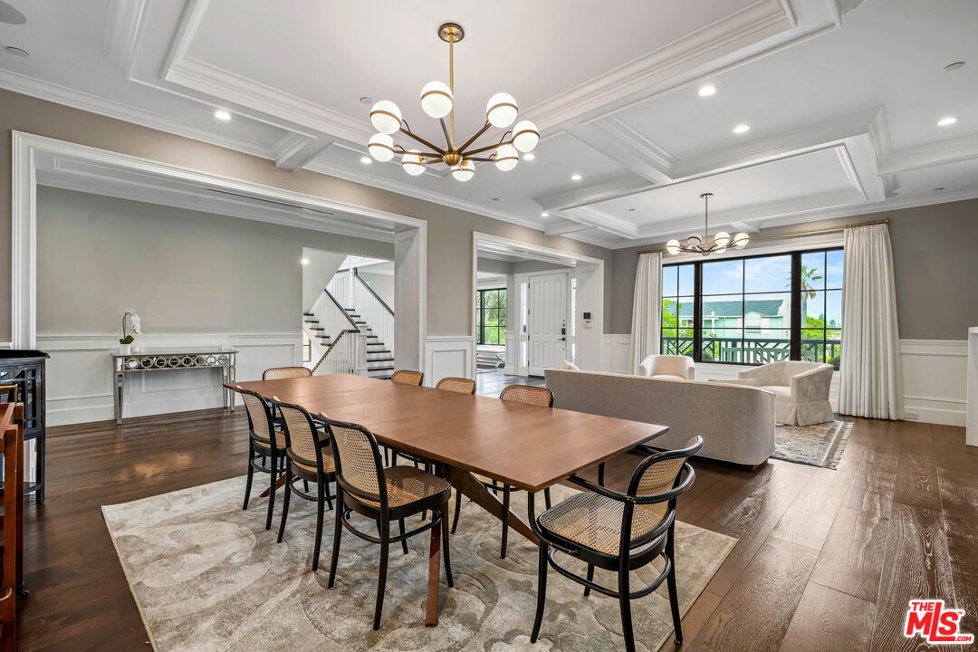 9348 Cresta Drive Los Angeles, CA 90035 - Photo 12 of 44 a view of a dining room with furniture window and wooden floor