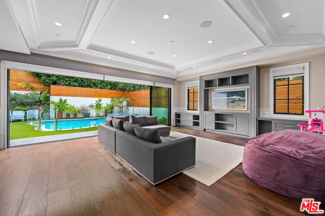 9348 Cresta Drive Los Angeles, CA 90035 - Photo 18 of 44 a living room with furniture and a large window