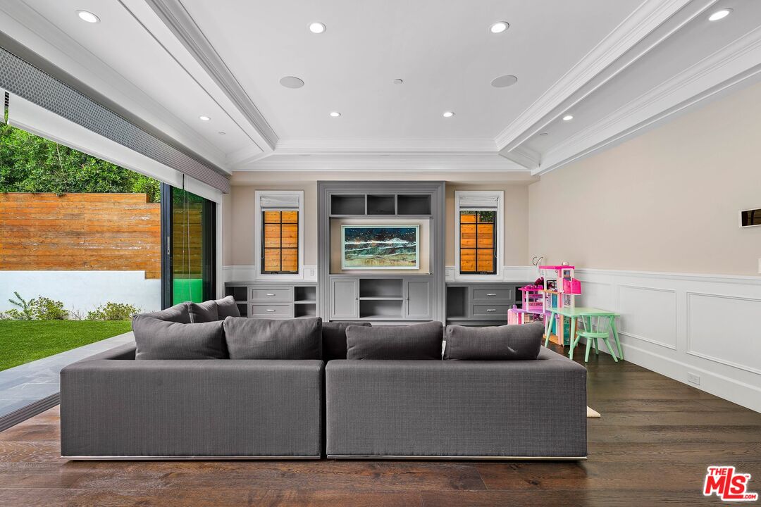 9348 Cresta Drive Los Angeles, CA 90035 - Photo 19 of 44 a living room with furniture window and wooden floor
