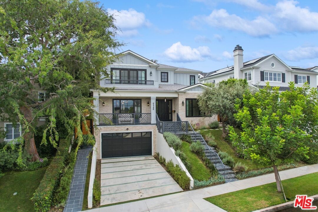 9348 Cresta Drive Los Angeles, CA 90035 - Photo 2 of 44 a front view of house with yard and green space