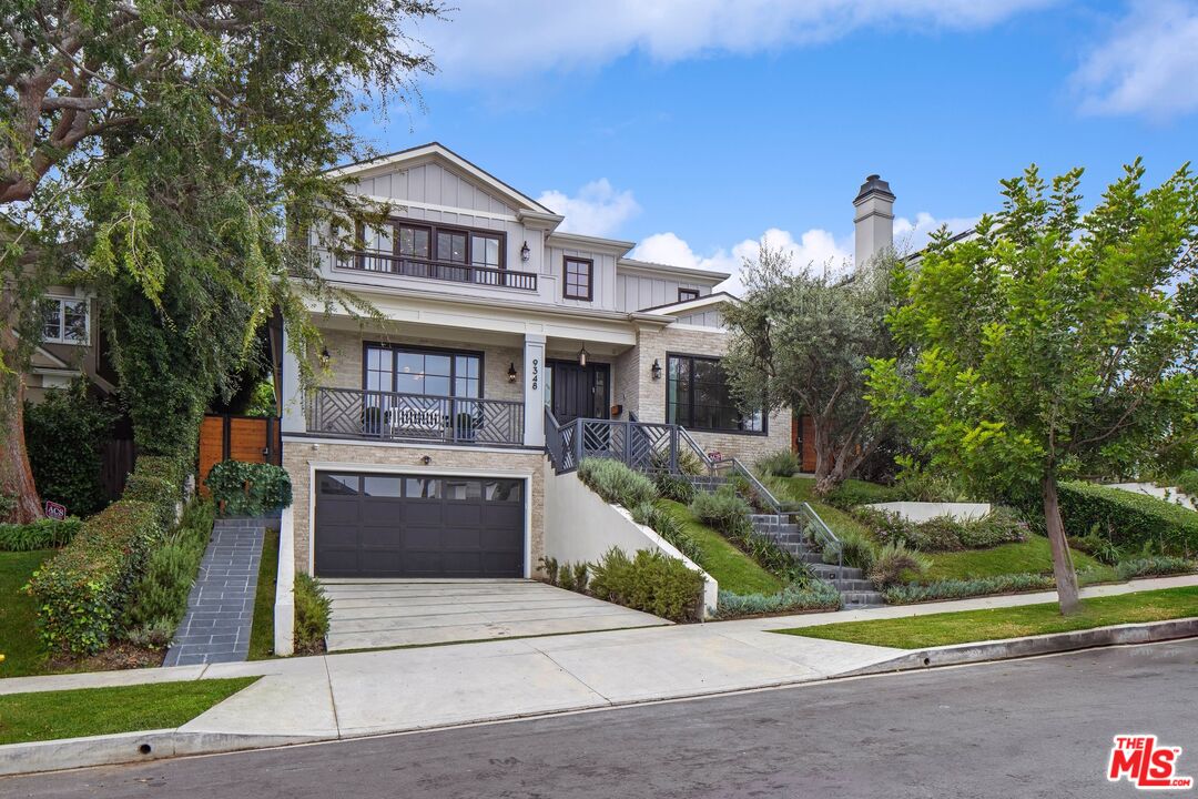 9348 Cresta Drive Los Angeles, CA 90035 - Photo 3 of 44 a front view of a house with garden