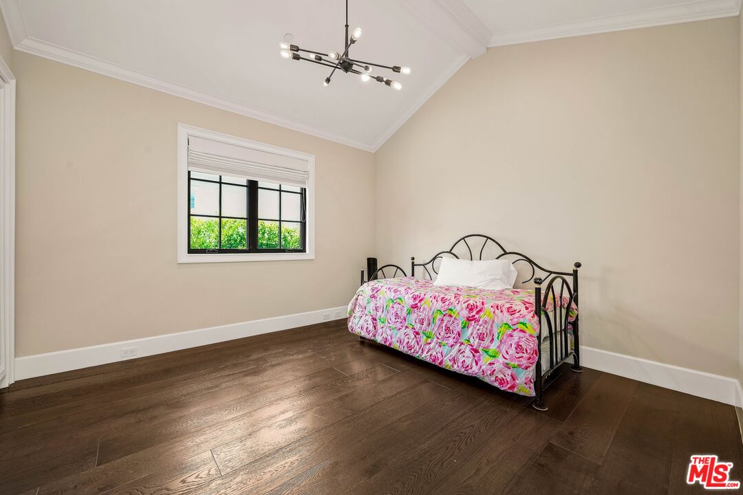 9348 Cresta Drive Los Angeles, CA 90035 - Photo 35 of 44 a bedroom with bed and a window