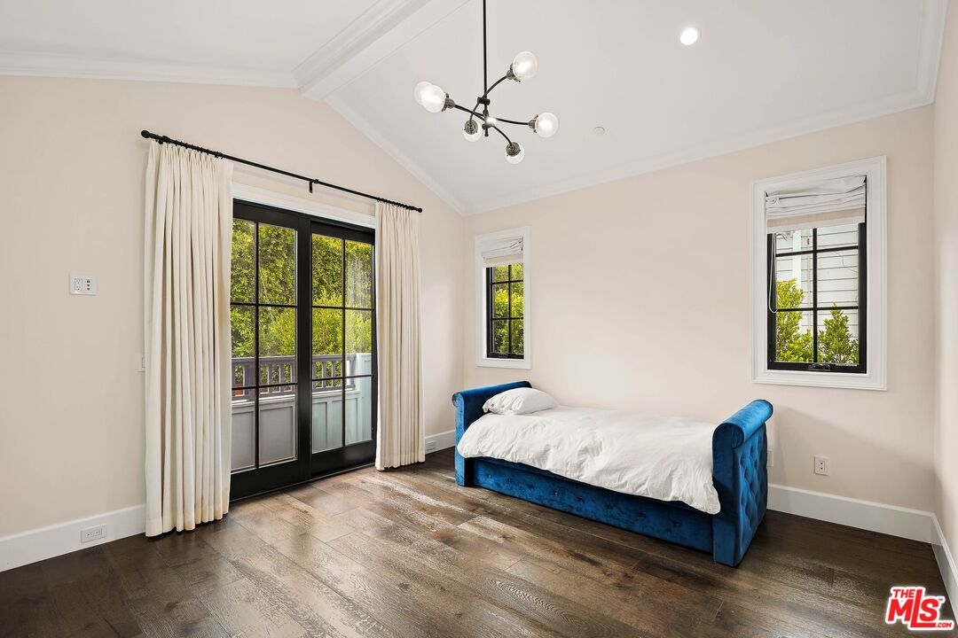 9348 Cresta Drive Los Angeles, CA 90035 - Photo 37 of 44 a bedroom with a bed and a window