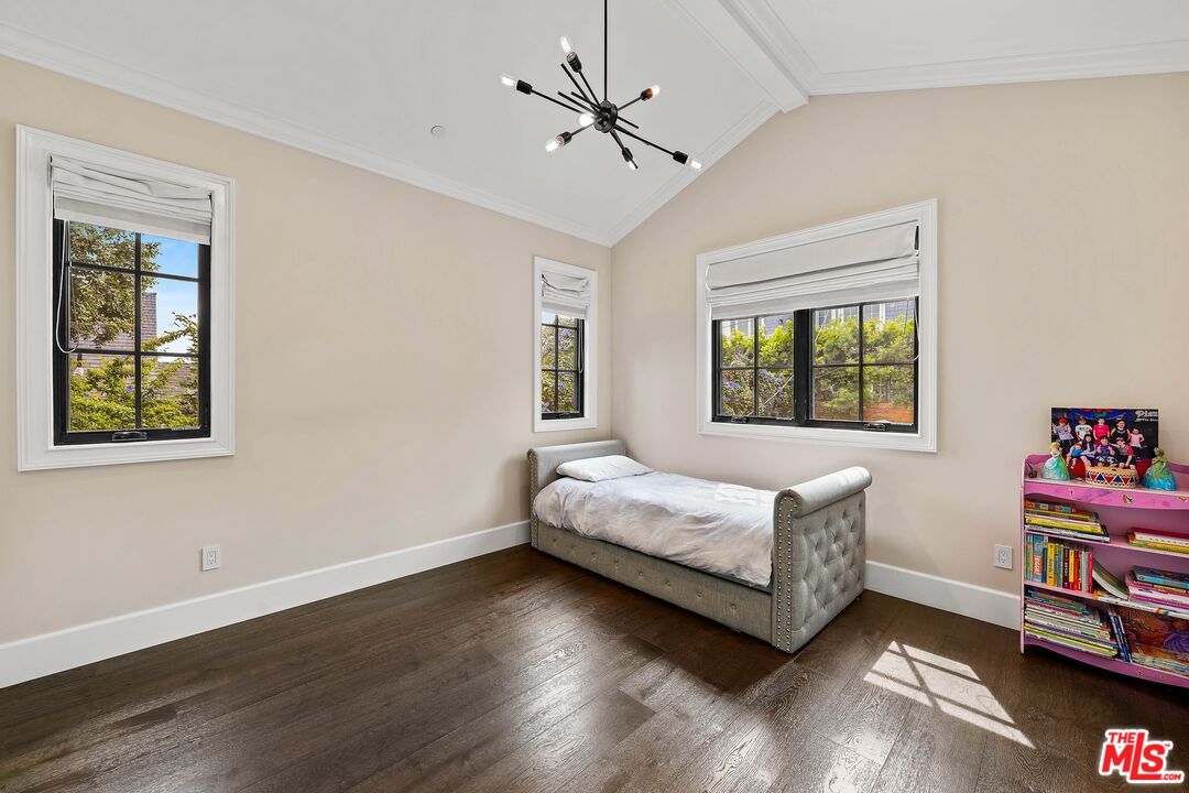 9348 Cresta Drive Los Angeles, CA 90035 - Photo 39 of 44 a living room with a bed furniture and a window