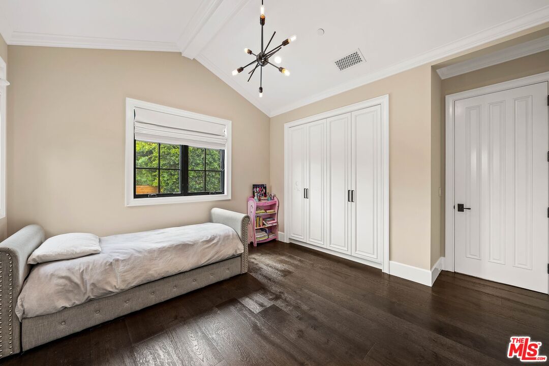 9348 Cresta Drive Los Angeles, CA 90035 - Photo 40 of 44 a bedroom with a bed and a window