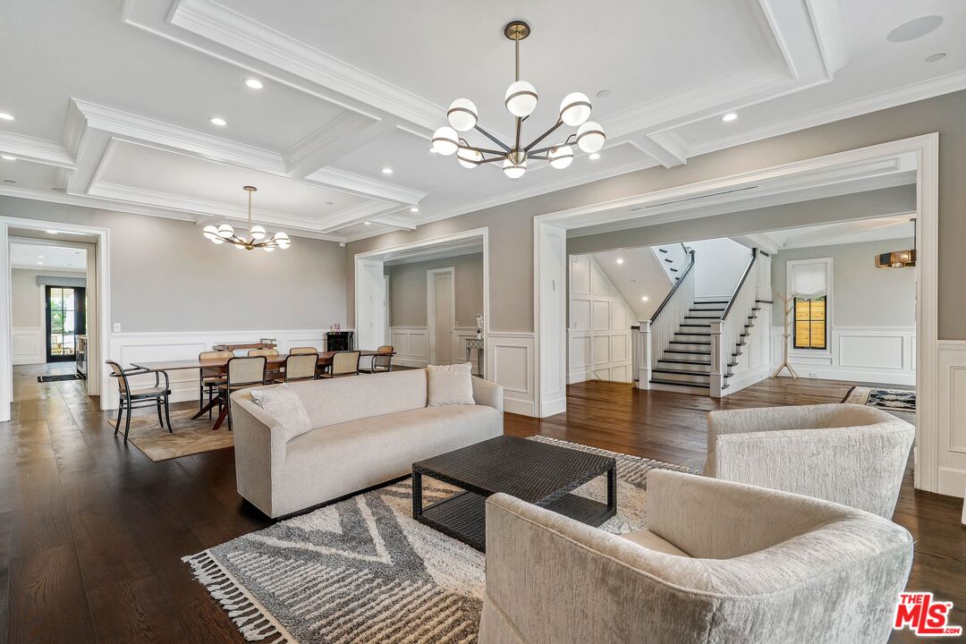 9348 Cresta Drive Los Angeles, CA 90035 - Photo 9 of 44 a living room with furniture and a large mirror