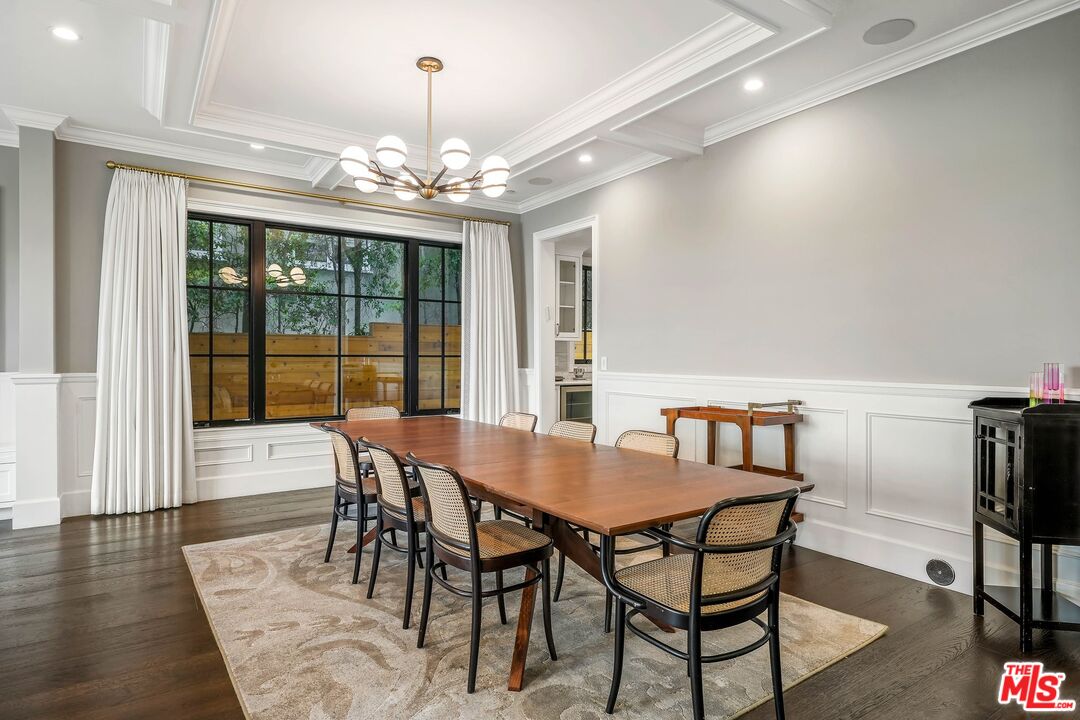 9348 Cresta Drive Los Angeles, CA 90035 - Photo 10 of 44 a view of a dining room with furniture window and wooden floor