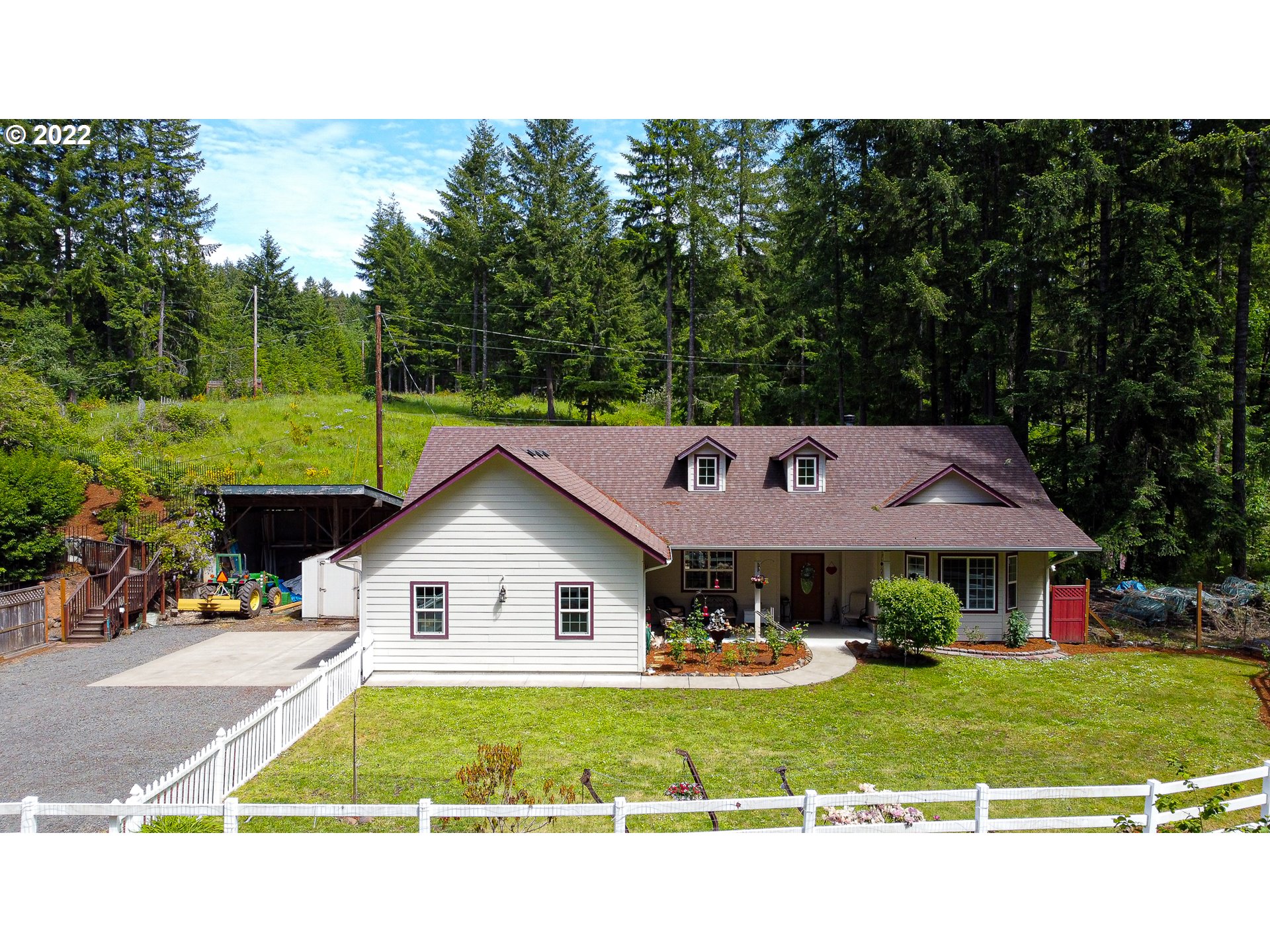 a view of house and outdoor space with yard