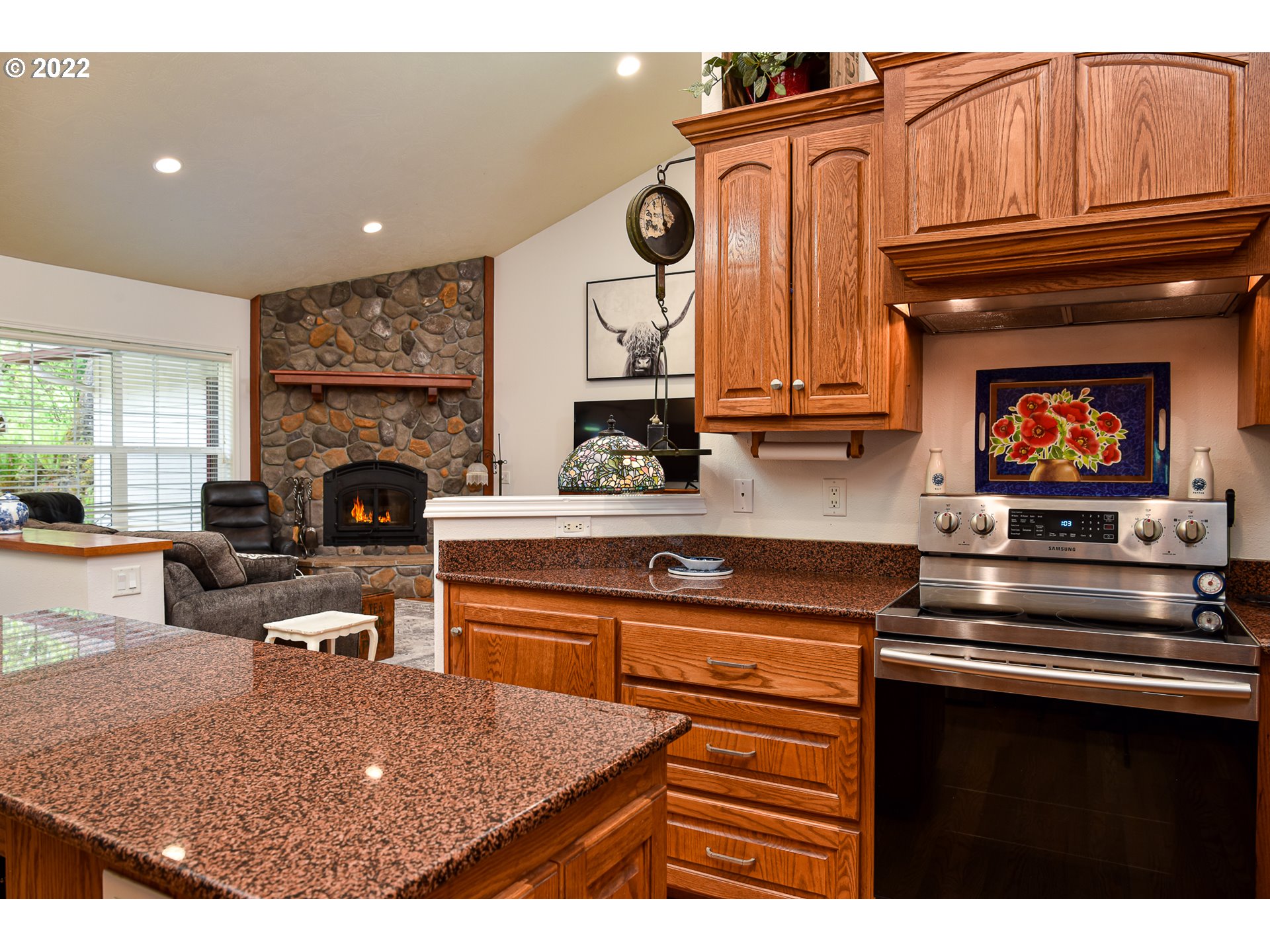 40156 Booth Kelly Road Springfield, OR 97478 - Photo 5 of 31 a kitchen with stainless steel appliances granite countertop a stove and cabinets