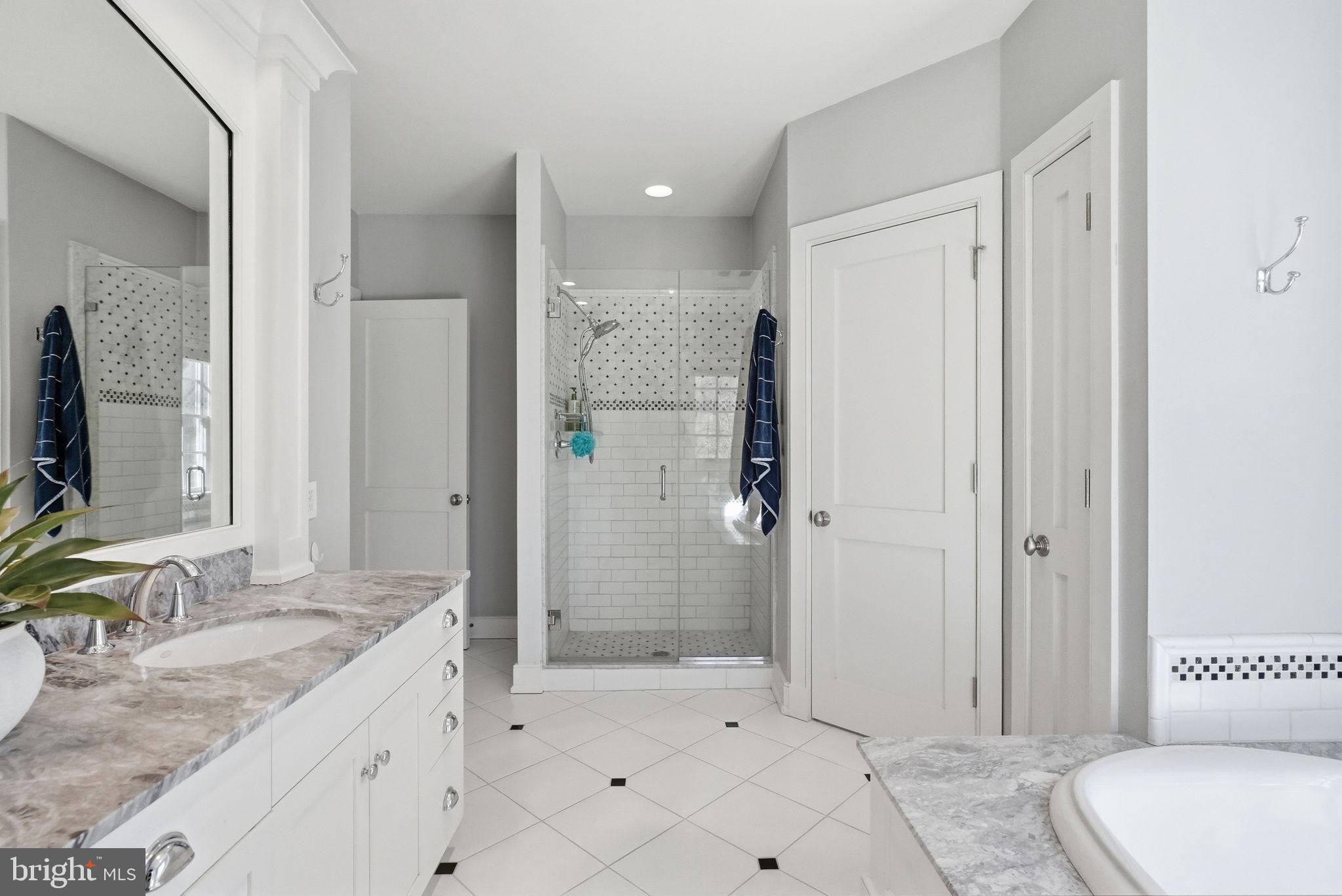 904 Plymouth Road Lower Gwynedd, PA 19002 - Photo 25 of 44 a bathroom with a granite countertop sink a toilet and shower