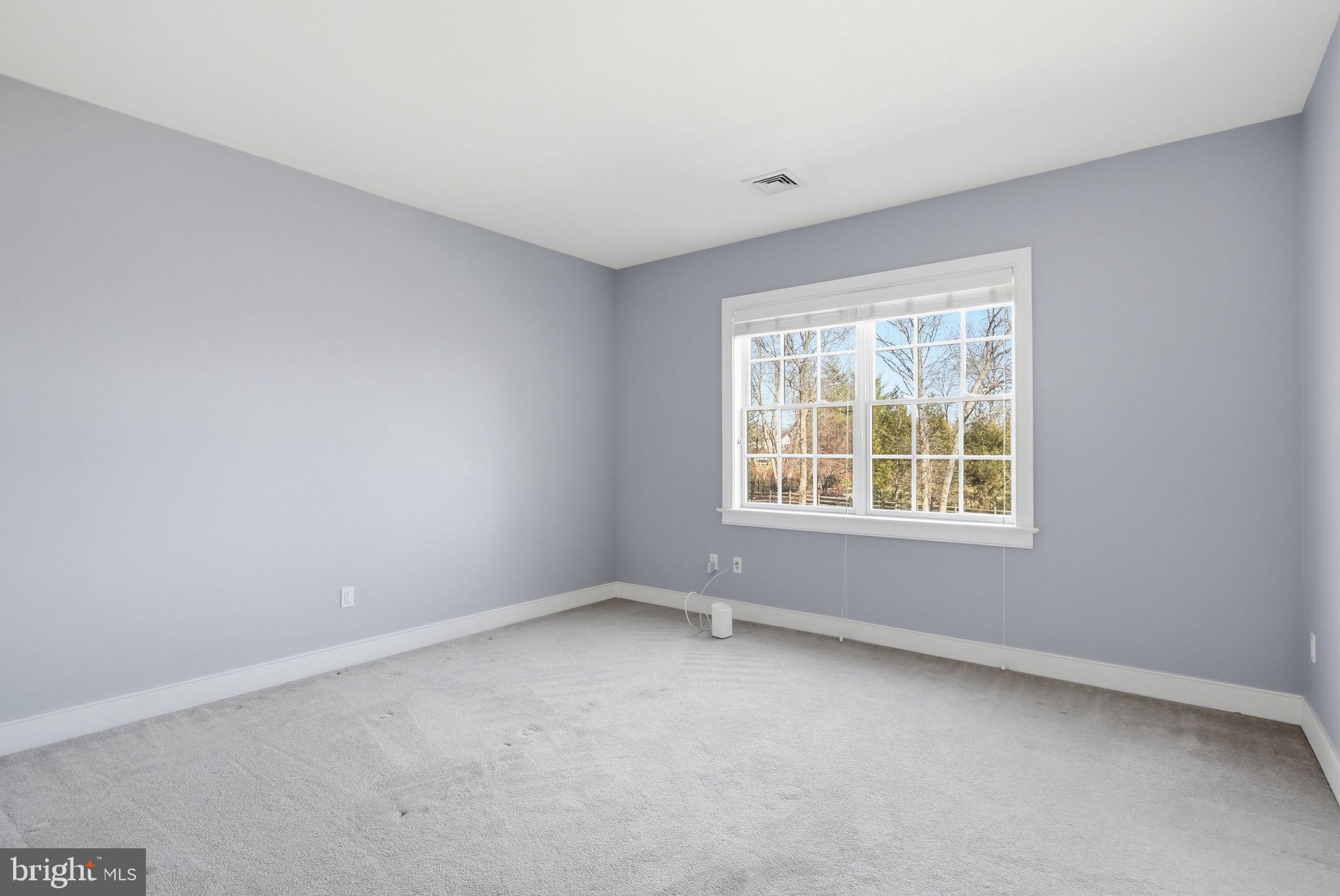 904 Plymouth Road Lower Gwynedd, PA 19002 - Photo 31 of 44 an empty room with a window