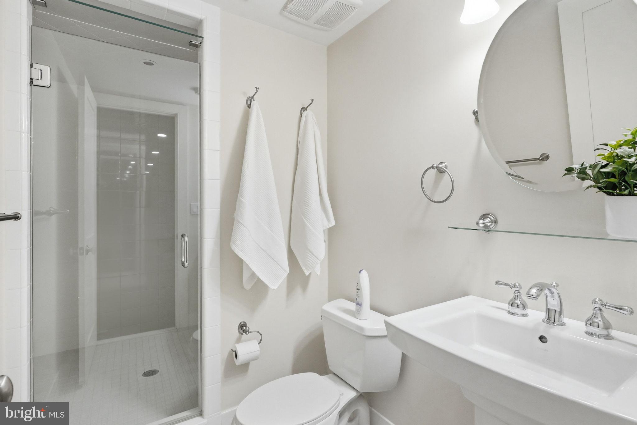 904 Plymouth Road Lower Gwynedd, PA 19002 - Photo 34 of 44 a bathroom with a sink toilet and shower