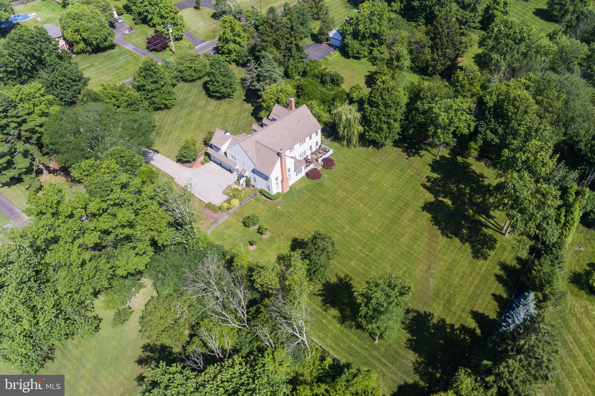 904 Plymouth Road Lower Gwynedd, PA 19002 - Photo 38 of 44 an aerial view of a house with a yard