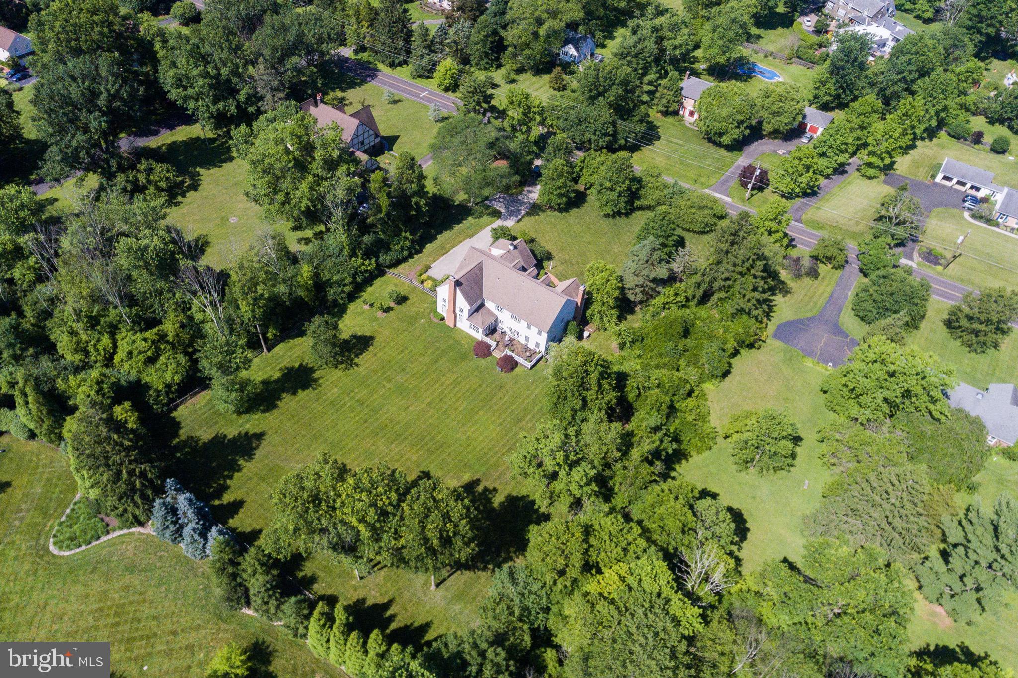 904 Plymouth Road Lower Gwynedd, PA 19002 - Photo 40 of 44 an aerial view of residential house with yard and swimming pool