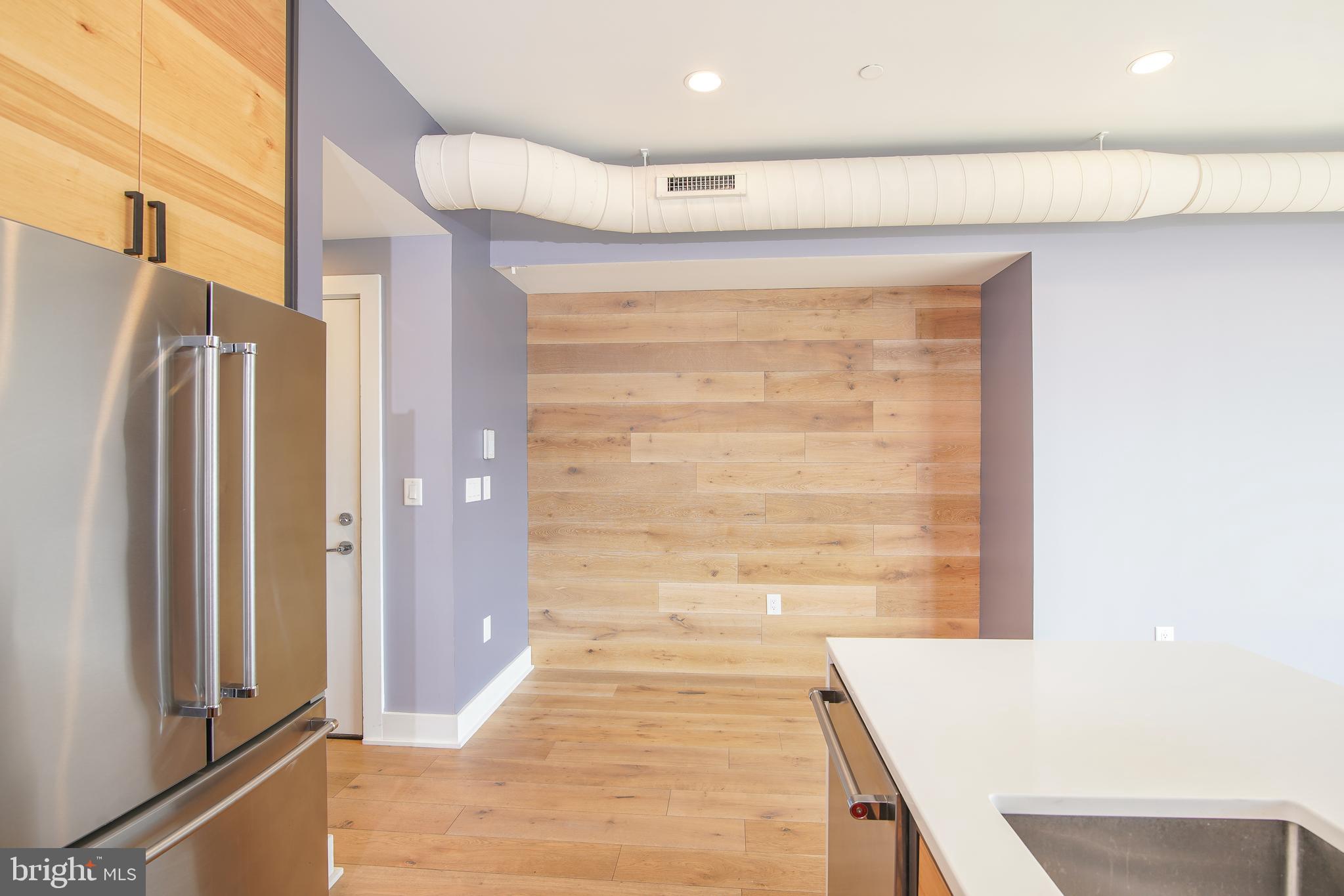 1012 Harvard Street Northwest, Unit 8 Washington, DC 20001 - Photo 11 of 34 Perfect touch - wood accent wall