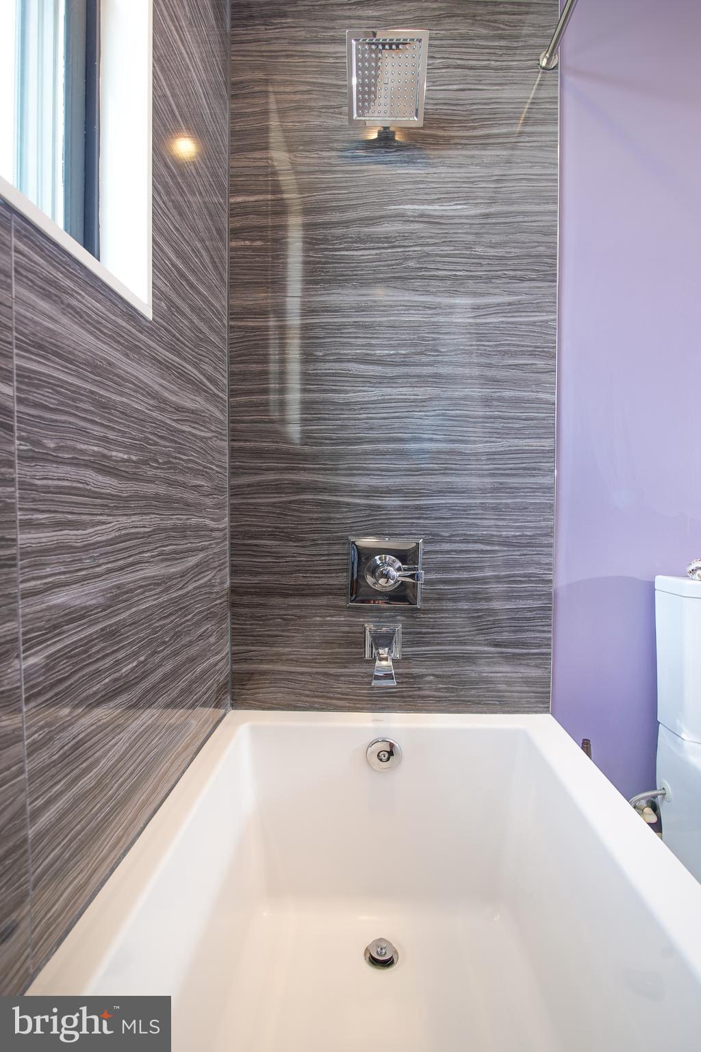 1012 Harvard Street Northwest, Unit 8 Washington, DC 20001 - Photo 14 of 34 Designer Porcelanosa Tile