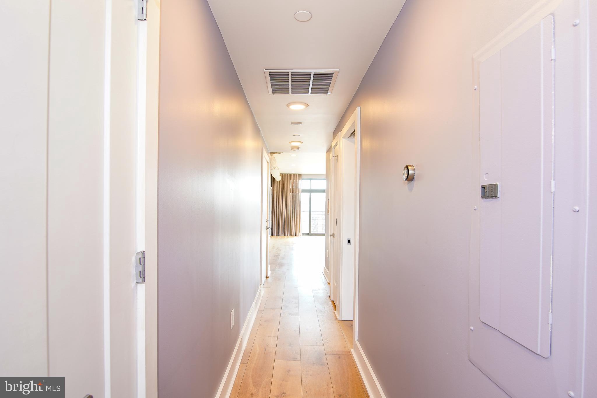 1012 Harvard Street Northwest, Unit 8 Washington, DC 20001 - Photo 34 of 34 Hallway to the Living Area